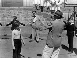images John Ford directs a schoolyard boxing match